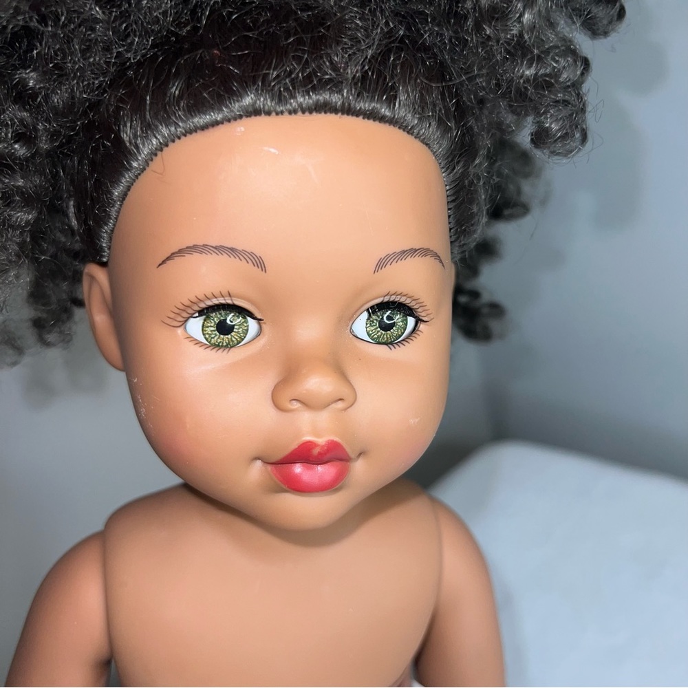 Madame Alexander 18” doll.